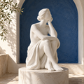 qevzunyl White Seated Figure Sculpture — styled interior view